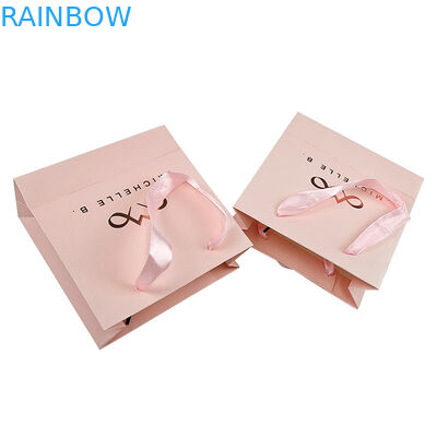 Custom Print Logo Elegante witte zwarte papieren geschenkzakken Luxe kleding boetiek papieren winkeltas met lint handvat