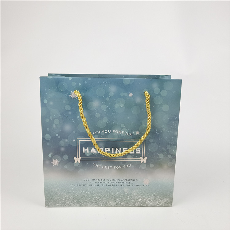 Best verkopen Recyclebaar milieuvriendelijk Logo Printed Shopping Paper Bag Verpakking Wit 110 gram Herbruikbaar