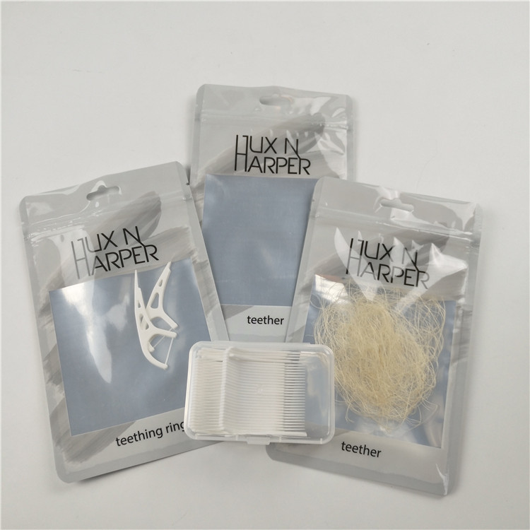 De glanzende duidelijke voortandzijde hangt de ritssluitingszak van gaten plastic zakken aluminiumfolie aangepaste verpakking